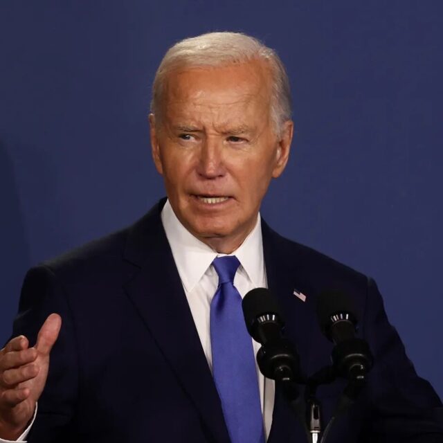 Biden standing at a podium.