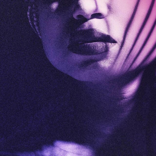 The lower half of a woman's face, a victim of trafficking.