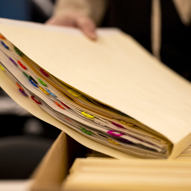 Molly Brown, Northeastern reference and outreach archivist, looks through records from the Freedom House and the Paul Parks and Ken Kruckemeyer papers in the Snell Library archives new reading room on Thursday, Feb. 15, 2024. Photo by Alyssa Stone/Northeastern University