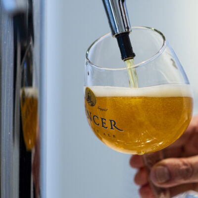 01/11/22 - BOSTON, MA - Father Isaac Keeley pours a beer from the tap at Spencer Brewery in Spencer, MA, on Tuesday, Jan. 11, 2022. Spencer Brewery is the only certified Trappist beer made in the United States. Photo by Alyssa Stone/Northeastern University
