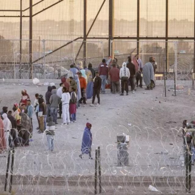 Migrants wait to be processed by U.S. Border Patrol officers at the U.S.-Mexico border in El Paso, Texas, on May 12, 2023.