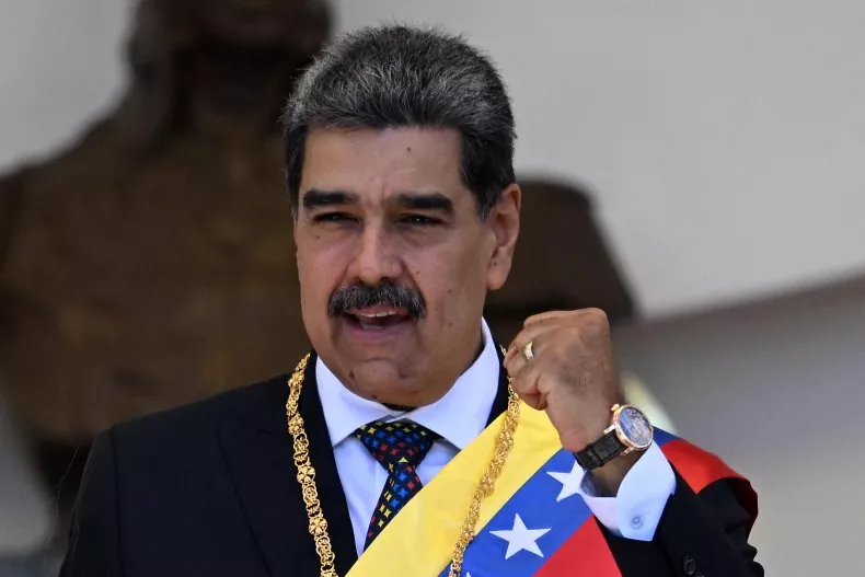 Nicolás Maduro, President of Venezuela, speaking at podium