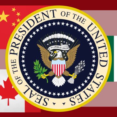 Presidential seal of the U.S. atop the Canadian, Chinese, and Mexican flags.