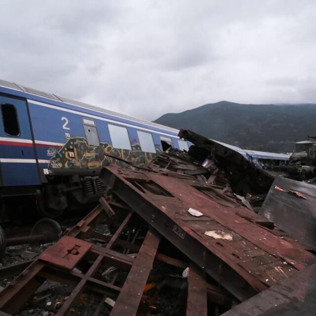 Wrecked wagons and mangled pieces of metal are seen near the tracks after a train accident in the Tempi Valley near Larissa, Greece, March 1, 2023.