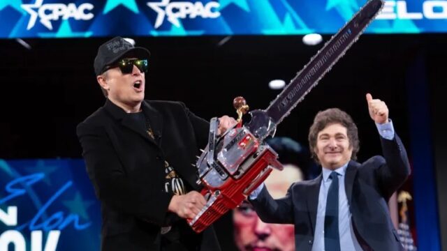 Elon Musk waves a chainsaw at the Conservative Political Action Conference at the Gaylord National Resort and Convention Center in Oxon Hill, Maryland, the United States, on February 20, 2025