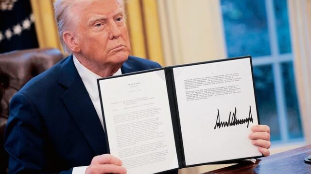 Trump signing executive orders enacting Project 2025 plans.