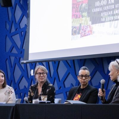 A group of panelists discussing topics at the Women's History Month Symposium