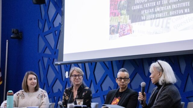 A group of panelists discussing topics at the Women's History Month Symposium