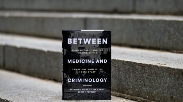 Northeastern professor Brandon Welsh’s book Between Medicine and Criminology explores the history of the Cambridge-Somerville Youth Study. Photo by Alyssa Stone/Northeastern University