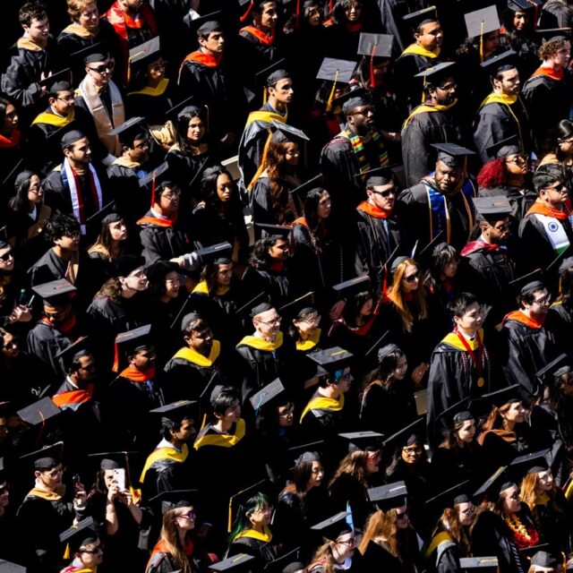 Students wear gap and gown at the commencement ceremony on May 11th.