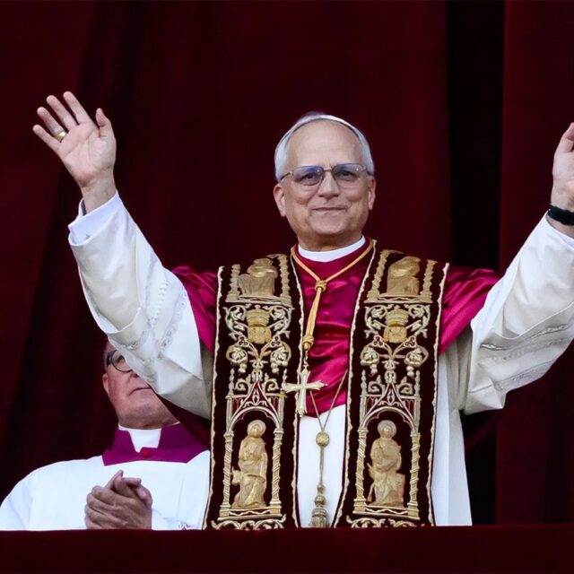 New Pope Leo XIV is introduced from the balcony of St. Peter’s Basilica in Vatican City on May 8, 2025. (Sipa via AP Images)