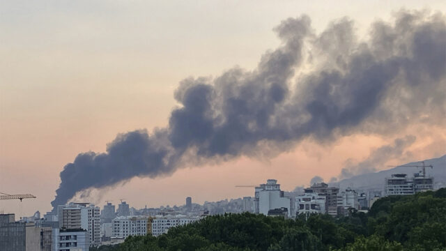 Smoke rises from the building of Iran's state-run television after an Israeli strike in Tehran, Iran, Monday, June 16, 2025. (AP Photo)