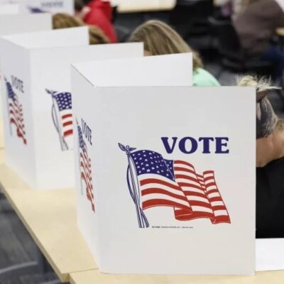 People cast their ballots on the last day of early voting for the general election in Michigan at the Livingston Educational Service Agency in Howell on November 3, 2024. Jeff Kowalsky/AFP via Getty Images