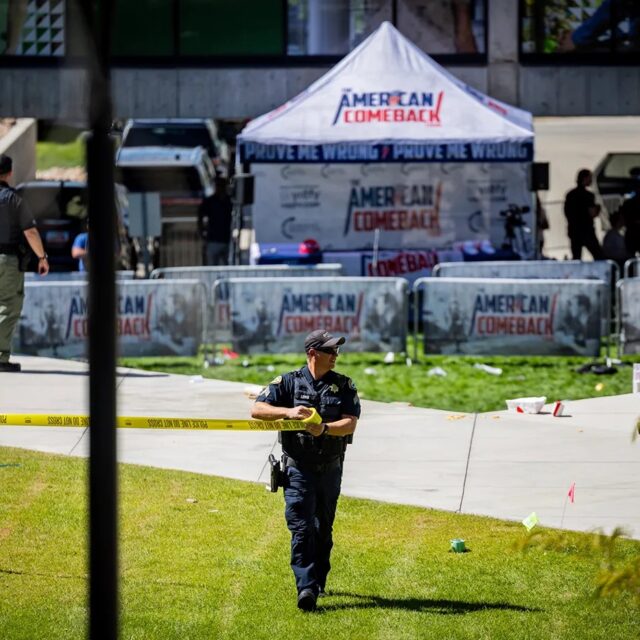 Law enforcement tapes off an area after political activist Charlie Kirk was shot at Utah Valley University