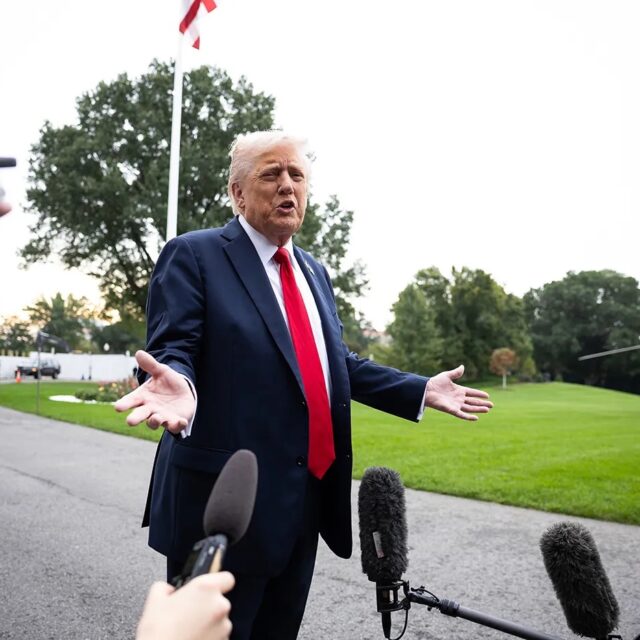 President Donald Trump speaks with reporters on the South Lawn of the White House on his way to board Marine One Sept. 30, 2025.