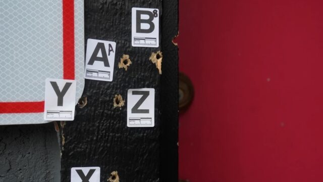 Bullet holes are shown where a mass shooting took place Saturday at a banquet hall in Stockton, Calif., Monday, Dec. 1, 2025. (AP Photo/Jeff Chiu)