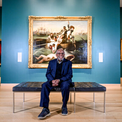 01/06/26 - BOSTON, MA. - Ted Landsmark, Northeastern Distinguished Professor of Public Policy and Urban Affairs and Director of the Kitty and Michael Dukakis Center, poses for photos next to the “Watson and the Shark” painting by John Singleton Copley in the Museum of Fine Arts on Jan. 6, 2026. Photo by Matthew Modoono/Northeastern University