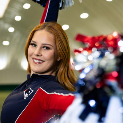 Lana Vogler, a Northeastern behavioral neuroscience and philosophy student and New England Patriots Cheerleader, shows off some of her cheerleading routine in the Carter Field Bubble on Monday, Feb. 2, 2026. Photo by Alyssa Stone/Northeastern University