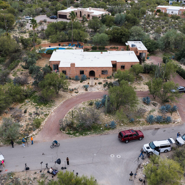 Members of the press work outside the home of Nancy Guthrie, the missing mother of “Today” show host Savannah Guthrie, Thursday, Feb. 5, 2026, in Tucson, Ariz. (AP Photo/Caitlin O'Hara)