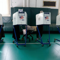 Voting citizens participate in the New York City mayoral election at Public School 99 in East Brooklyn, on November 4, 2025. From early on, long lines form outside the more than 14,000 polling stations open in the five boroughs, amid a mayoral race pitting Democrat Zohran Mamdani against independent and former governor Andrew Cuomo and Republican Curtis Sliwa. (Photo by Deccio Serrano/NurPhoto via AP)
