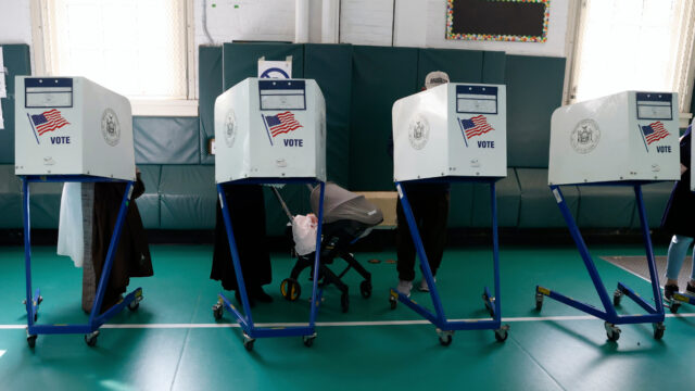 Voting citizens participate in the New York City mayoral election at Public School 99 in East Brooklyn, on November 4, 2025. From early on, long lines form outside the more than 14,000 polling stations open in the five boroughs, amid a mayoral race pitting Democrat Zohran Mamdani against independent and former governor Andrew Cuomo and Republican Curtis Sliwa. (Photo by Deccio Serrano/NurPhoto via AP)