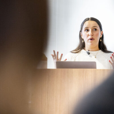 03/16/26 - BOSTON, MA. - Melina Coy, a fifth-year student majoring in business administration and politics, presents a digital exhibit that uses her great-grandfather Ralph Ettelson’s story to explore Holocaust history and Jewish life in the places he lived and immigrated through: Vilkaviškis, Lithuania, the Dominican Republic, and New York City, during the Holocaust Legacy Foundation Gideon Klein Scholar Presentation in Renaissance Park 909 on March 16, 2026. Photo by Matthew Modoono/Northeastern University