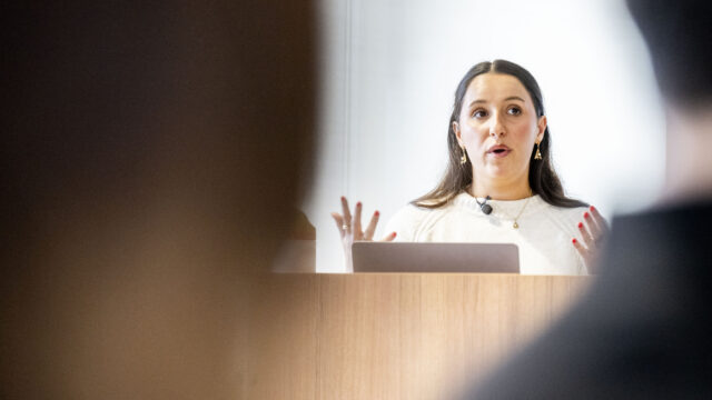 03/16/26 - BOSTON, MA. - Melina Coy, a fifth-year student majoring in business administration and politics, presents a digital exhibit that uses her great-grandfather Ralph Ettelson’s story to explore Holocaust history and Jewish life in the places he lived and immigrated through: Vilkaviškis, Lithuania, the Dominican Republic, and New York City, during the Holocaust Legacy Foundation Gideon Klein Scholar Presentation in Renaissance Park 909 on March 16, 2026. Photo by Matthew Modoono/Northeastern University