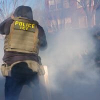 Tear gas is deployed amid protesters near the scene where Renee Good was fatally shot by an ICE officer last week, Tuesday, Jan. 13, 2026, in Minneapolis.(AP Photo/Adam Gray)