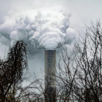 Pollution and steam rise from the stacks of the Miami Fort Power Station situated along the Ohio River near Cincinnati, Ohio, on March 27, 2026. (Photo by Jason Whitman/NurPhoto via AP)