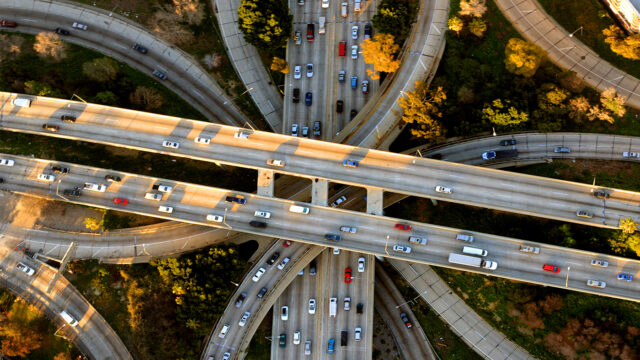 Helicopter Aerial View of the famous Los Angeles Four Level freeway interchange