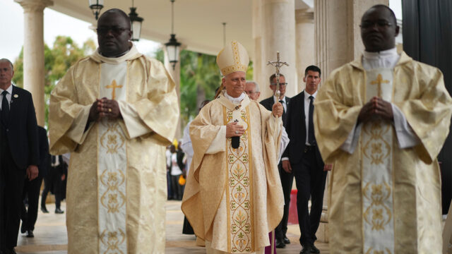 Pope Leo XIV arrives to celebrate the Holy mass at the Basilica of the Immaculate Conception of Mongomo, Equatorial Guinea, Wednesday, April 22, 2026, on the tenth day of his 11-day pastoral visit to Africa. (AP Photo/Andrew Medichini)
