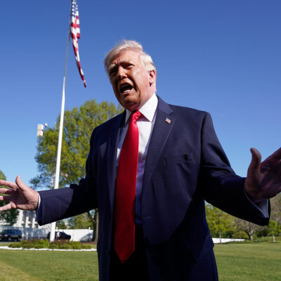 President Donald Trump talks to the media on the South Lawn before departing on Marine One at the White House, Saturday, April 11, 2026, in Washington. (AP Photo/Jose Luis Magana)