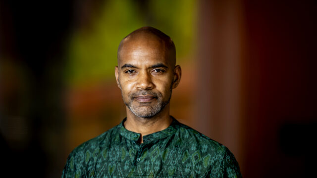 05/06/26 - BOSTON, MA. - Kris Manjapra, Stearns Trustee Professor of History and Global Studies, poses for a portrait on May 6, 2026. Manjapra was recently named a 2026-2027 Guggenheim Fellow for intellectual and cultural history. Photo by Matthew Modoono/Northeastern University