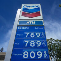 The gasoline price board is displayed at a gas station, Wednesday, April 15, 2026, in Menlo Park, Calif. (AP Photo/Jeff Chiu)