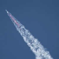 SpaceX's Starship rocket 38 launches during the 11th test flight on October 13, 2025 as seen from South Padre Island in Texas. SpaceX's massive Starship rocket soared into its latest test flight Monday, as the US company vies to defy critics who say its technology might not be on track to deliver NASA's lunar projects and fulfill Elon Musk's Mars ambitions. (Photo by Gabriel V. Cardenas / AFP) (Photo by GABRIEL V. CARDENAS/AFP via Getty Images)