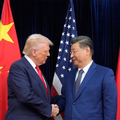 FILE - President Donald Trump, left, and Chinese President Xi Jinping, right, shake hands before their meeting at Gimhae International Airport in Busan, South Korea, Oct. 30, 2025. (AP Photo/Mark Schiefelbein, File)