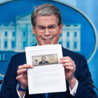 UNITED STATES - MAY 28: Treasury Secretary Scott Bessent holds a printout of a proposed $250 bill featuring a picture of President Donald Trump, during the White House press briefing where he addressed Trump Accounts, the war in Iran, and inflation among other issues, on Thursday, May 28, 2026. (Tom Williams/CQ Roll Call via AP Images)