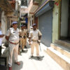 PATNA, INDIA - MAY 16: Police personnel stand guard at Jagat Villa Apartment after Bihar Economic Offences Unit (EOU) condusts raid at the residence of an executive engineer of Rural Works department Gopal Kumar in connection with alleged Rs. 2 crore disproportionate assets, on May 16, 2026 in Patna, India. (Photo by Santosh Kumar/Hindustan Times via Getty Images)
