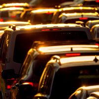 Heavy traffic jam during rush hour at sunset or dawn.