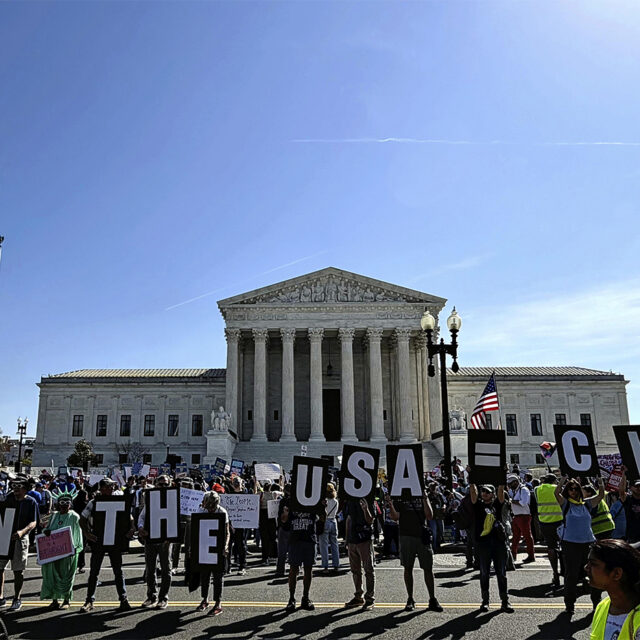 People and human rights activists protest Trump's calls to revise the 