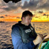 He’s a Northeastern grad commanding a Coast Guard vessel in Guam