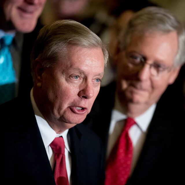 Sen. Lindsey Graham, R-S.C., flanked by Senate Majority Leader Mitch McConnell, R-Ky., right, speaks to reporters at the Capitol in Washington, Sept. 26, 2017. (AP Photo/Andrew Harnik, File)