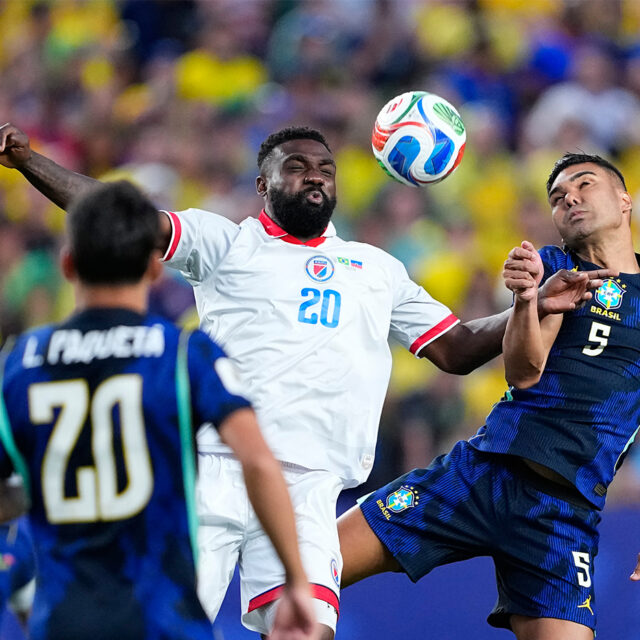 Brazil's Casemiro (5) battles for the ball with Haiti's Frantzdy Pierrot (20) during the World Cup Group C soccer match between Brazil and Haiti in Philadelphia, Friday, June 19, 2026. (AP Photo/Petr David Josek)