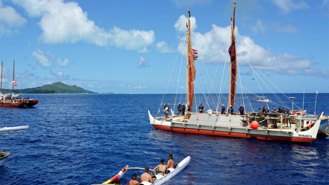 BORA BORA, FRENCH POLYNESIA - AUGUST 09: Welcome ceremony for the traditional Polynesian double-hulled canoes Hokule'a - a motorless canoe - and Hikianalia - a support canoe on their final stop in French Polynesia as part of the Moananuiākea voyage on August 09, 2025 in Bora Bora, French Polynesia. (Photo by Sylvain Lefevre/Getty Images)