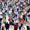 London, UK. June 14th 2023. A crowd of people waiting for an early evening train at Liverpool Street station.