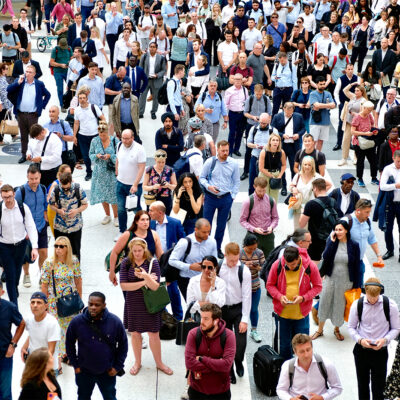London, UK. June 14th 2023. A crowd of people waiting for an early evening train at Liverpool Street station.