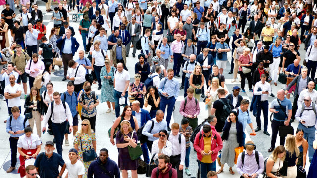 London, UK. June 14th 2023. A crowd of people waiting for an early evening train at Liverpool Street station.