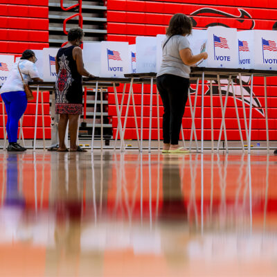 People vote in the primary election at Oak Park High School in Oak Park, Mich., Tuesday, Aug. 4, 2026, (AP Photo/Nic Antaya)