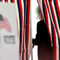 Camille Coulborn of Chesterfield, N.H., fills out her ballot inside a voting booth in Chesterfield during the New Hampshire State Primaries on Tuesday, Sept. 8, 2026. (Kristopher Radder/The Brattleboro Reformer via AP)
